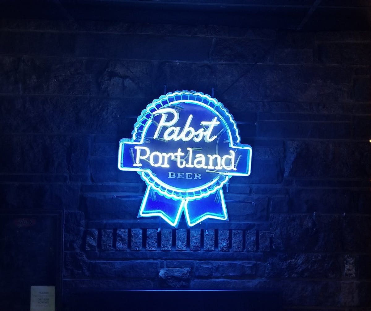 a blackboard sign outside of a building